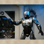 Ultimate Battle Damaged Robocop with Chair Action Figur