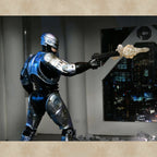 Ultimate Battle Damaged Robocop with Chair Action Figur